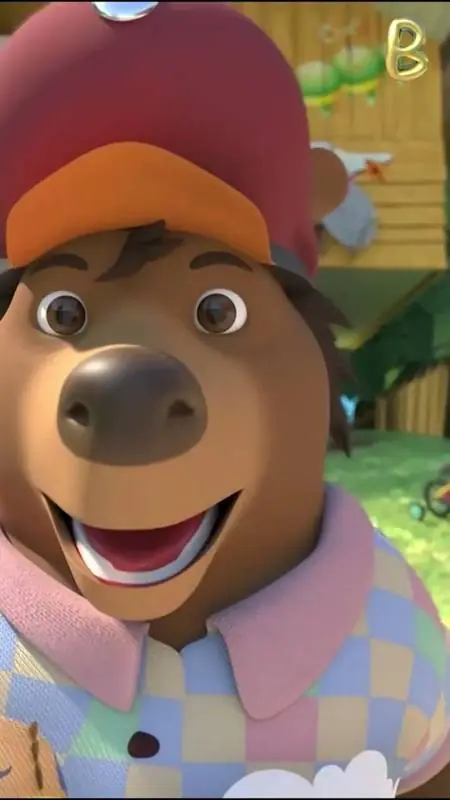 Papa Babloo, a big brown bear in a red B cap and checked shirt, playing with blocks